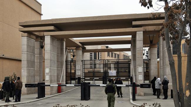 Afghan security guard stand at the site of a blast in the Kabul Serena Hotel gate, in Kabul, in 2008. Picture: AFP