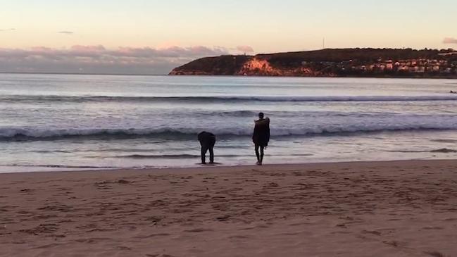 Sunrise vigil held for Justine Damond on a Sydney beach