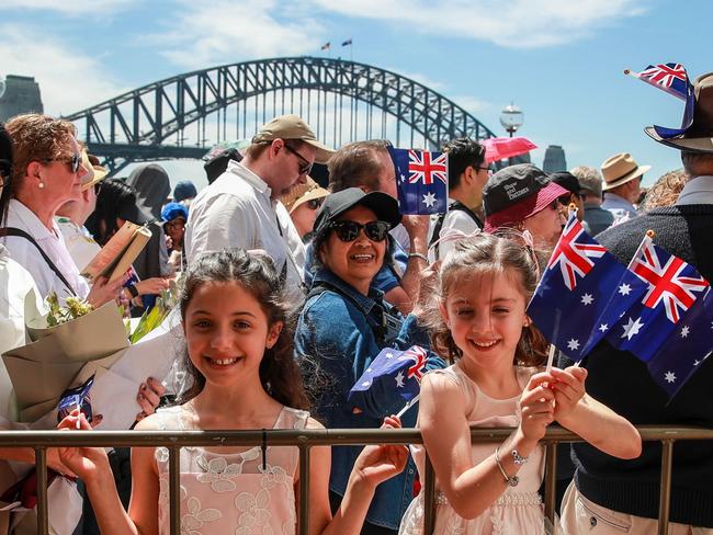 SYDNEY, AUSTRALIA - OCTOBER 22: Members of the public gather outside Sydney Opera House prior to a visit from King Charles III and Queen Camilla at the Sydney Opera House on October 22, 2024 in Sydney, Australia. The King's visit to Australia is his first as monarch, and the Commonwealth Heads of Government Meeting (CHOGM) in Samoa will be his first as head of the Commonwealth. (Photo by Roni Bintang/Getty Images)