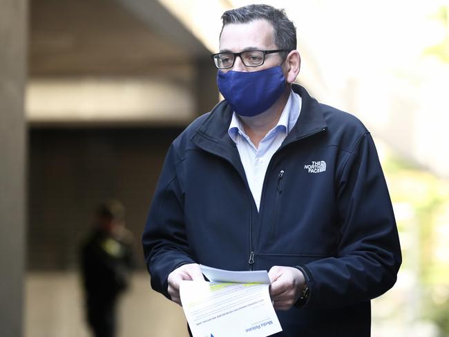 Victorian Premier Daniel Andrews wears a face mask before Sunday’s briefing. Picture: Getty Images