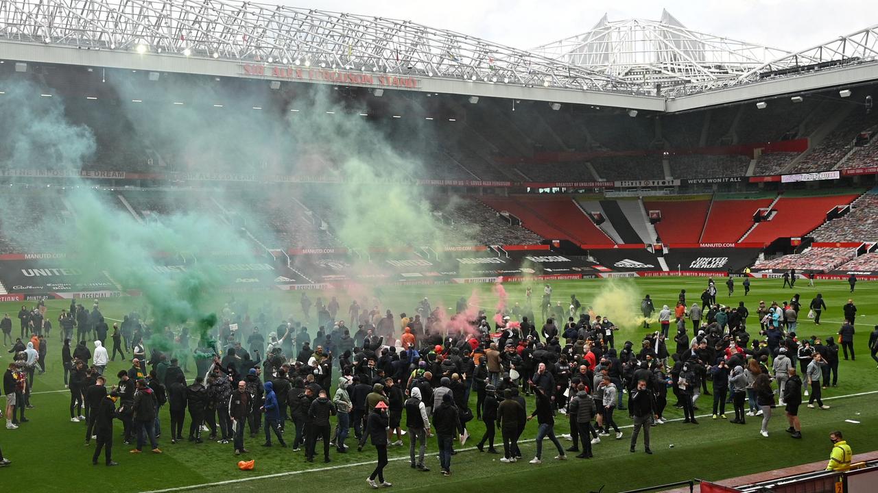 Manchester United protesters stormed Old Trafford ahead of the clash with Liverpool. (Photo by Oli SCARFF / AFP)