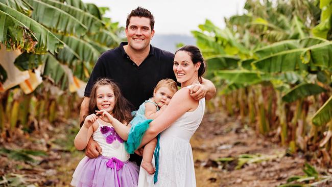 Rob and Krista Watkins with daughters Kate and Kira on their Walkamin property in North Queensland.