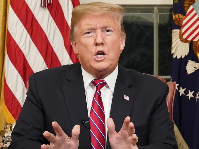 President Donald Trump speaks from the Oval Office of the White House as he gives a prime-time address about border security Tuesday, Jan. 8, 2018, in Washington. (Carlos Barria/Pool Photo via AP)