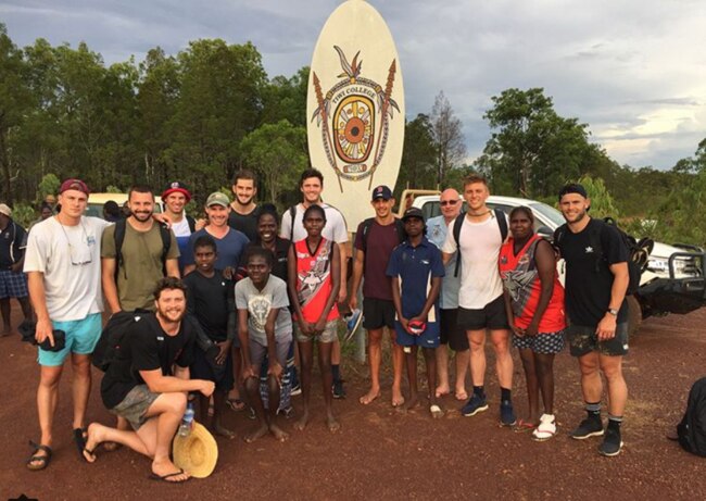 St Kilda leadership group players Jack Newnes, Jarryn Geary, Dylan Roberton, Josh Bruce, Ben Long, Seb Ross and Maverick Weller at Tiwi College during a recent trip to the Tiwi Islands. Picture: Instagram