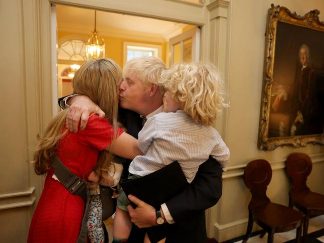 Boris Johnson comforted by his wife Carrie and their children after resigning. Picture: Supplied