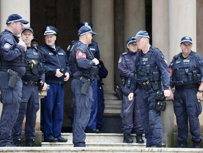 Police outside Sydney Town Hall on Saturday morning, where the NSW Labor Party Annual State Conference will be held. Picture: Tim Hunter