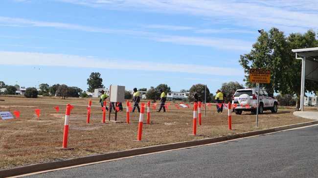 COVID-19: Workers and police at the Blackwater Hopsital after a coronavirus death in Blackwater on Tuesday night.