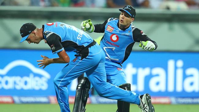 Alex Carey and Billy Stanlake in a tangle. Picture: Getty