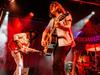 Rebuilding rock band takes country detour