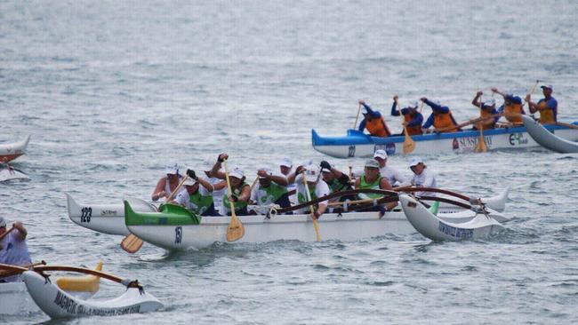 Outrigger canoes in action. Photo: Townsville Outrigger Canoe Club