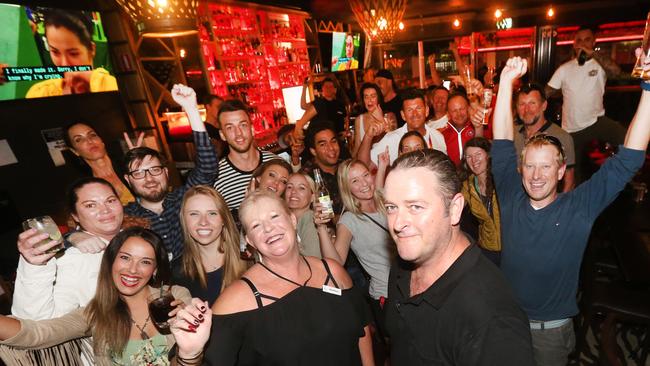 Swannies Bar in Southport Co owner Simon King and his Day manager Margo Richards ( In front) - the venue was on the tramline and packed out before, during and after the swimming nearby at the Gold Coast Aquatic Centre. Picture Mike Batterham