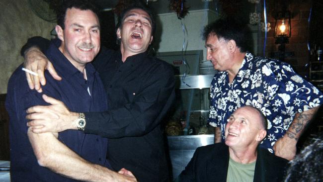 Mario Condello (left) being embraced by mobster Nik ‘The Russian’ Radev.