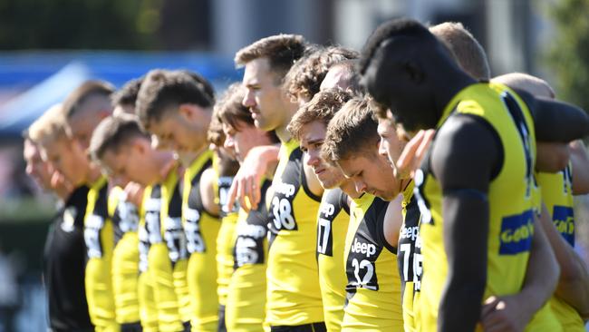 Richond players observe a moment of silence for Frawley before the VFL Preliminary Final on Saturday. Picture: AAP