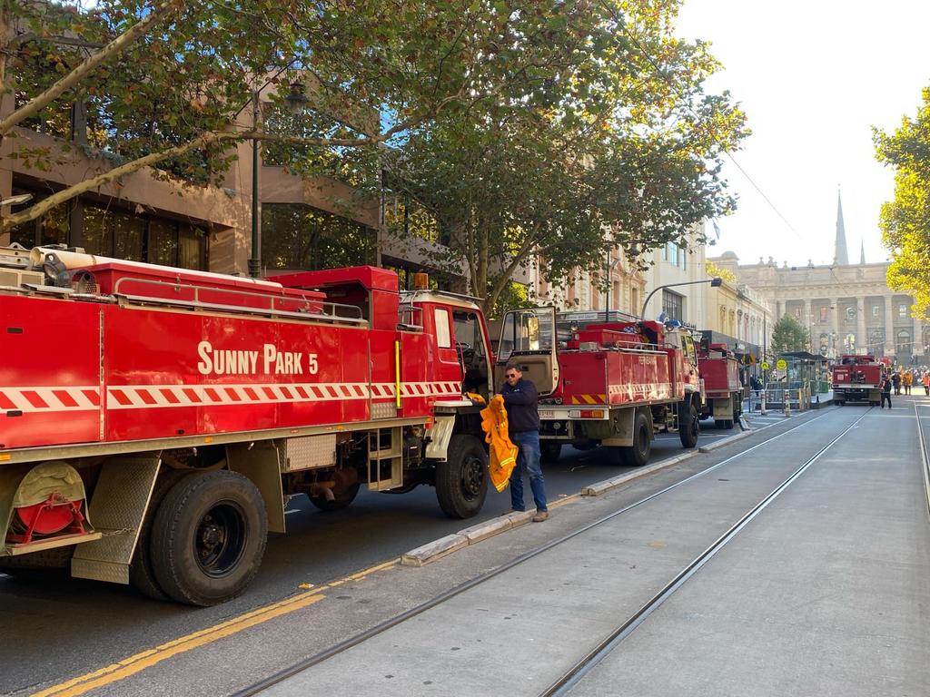 A convoy of CFA trucks makes its way to Victoria's parliament to protest the new emergency services levy. Picture: Regan Hodge