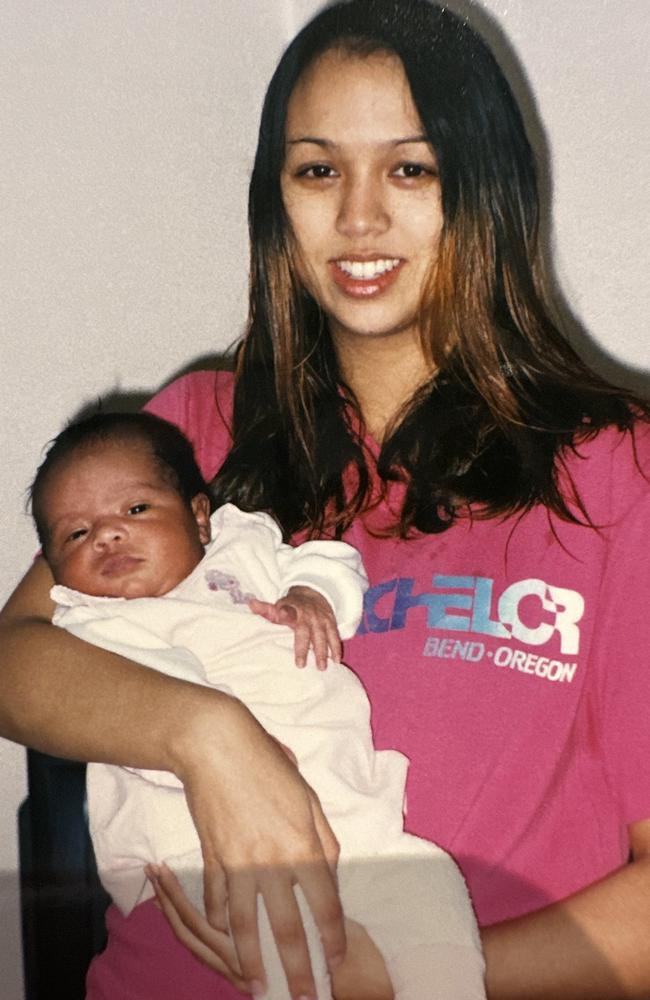 Kat Clark with a baby Latisha who she had when she was 17-years-old. Picture: Supplied.