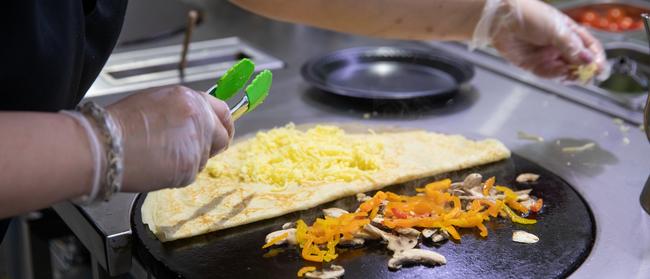 Crepe and Co owner Anna Tildiz at the hotplate. Photo: Dominika Lis