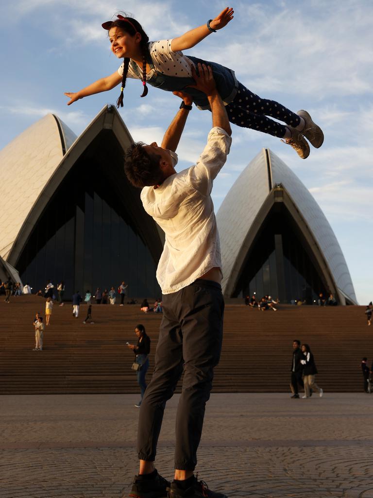32. Christopher Hall and his daughter Alexis Arnold-Hall, 9, have perfected the lift in the famous scene from the 1980s hit film Dirty Dancing. They performed it as part of the 50th celebrations at the Sydney Opera House. Picture: Jonathan Ng