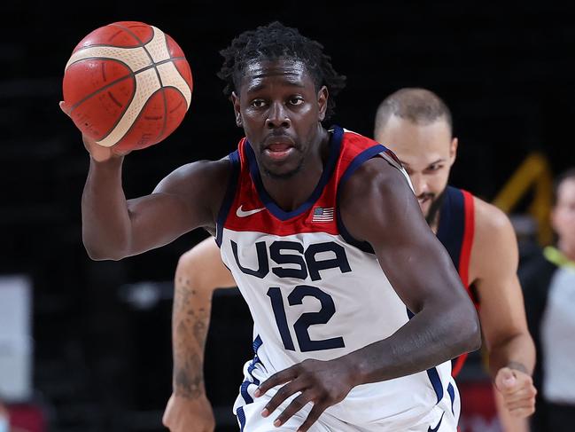 Jrue Holiday dribbles the ball past France's Evan Fournier. Picture: AFP