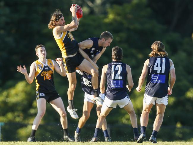 Frankston YCW’s BJ Credlin takes a mark on Saturday. Picture: Valeriu Campan