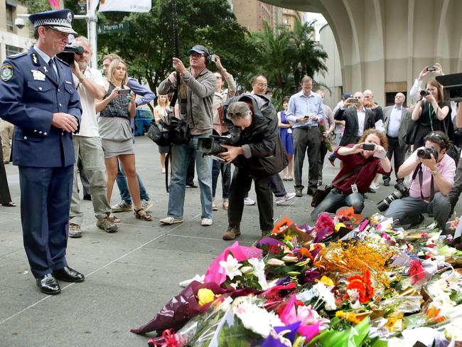 Police Commissioner Andrew Scipione at the Martin Place flower memorial.