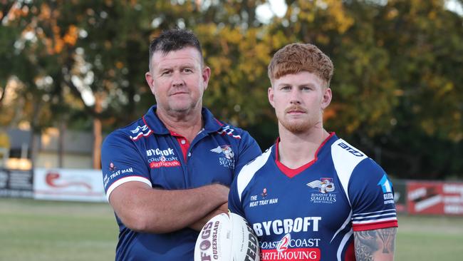 Former Runaway Bay player Brian Hamilton watches his son Guy Hamilton walk in his footsteps 20 years later, playing for Runaway Bay in the Grand final. Picture Glenn Hampson.