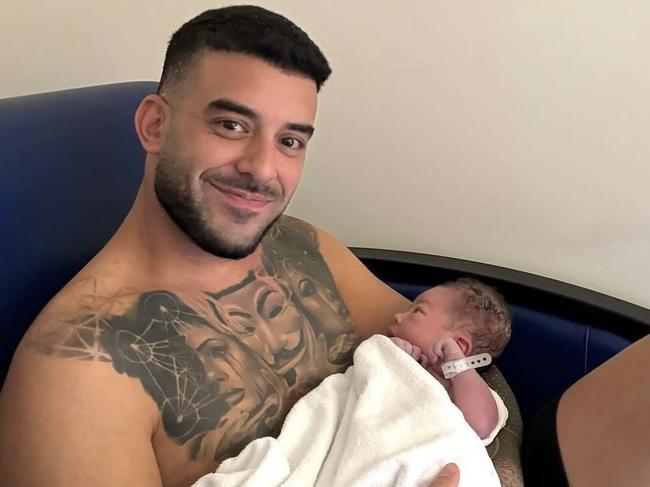 Adrian Portelli with his new baby son. Pic: Instagram