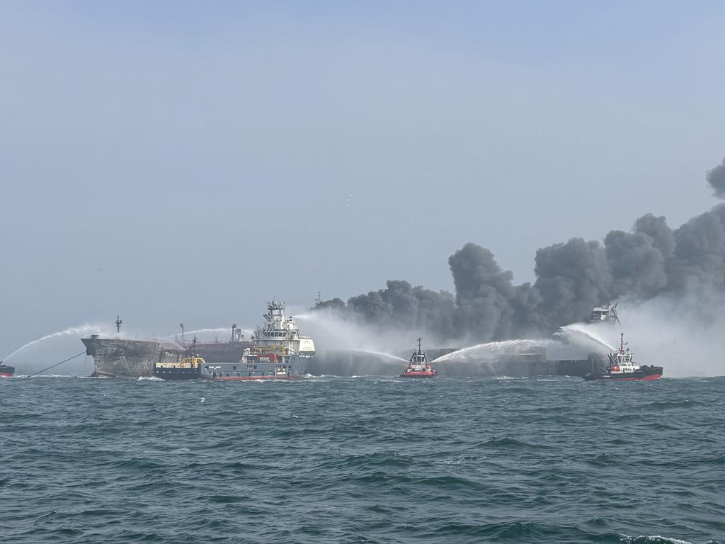 Fire and rescue services attend after the collision. Picture: Getty Images