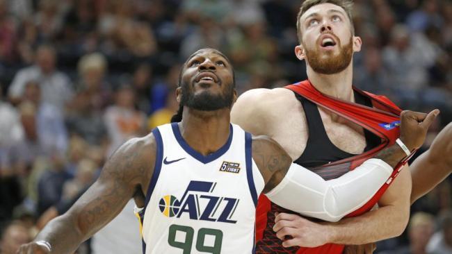 Perth Wildcats forward Nick Kay battles Utah Jazz forward Jae Crowder. Picture: AP