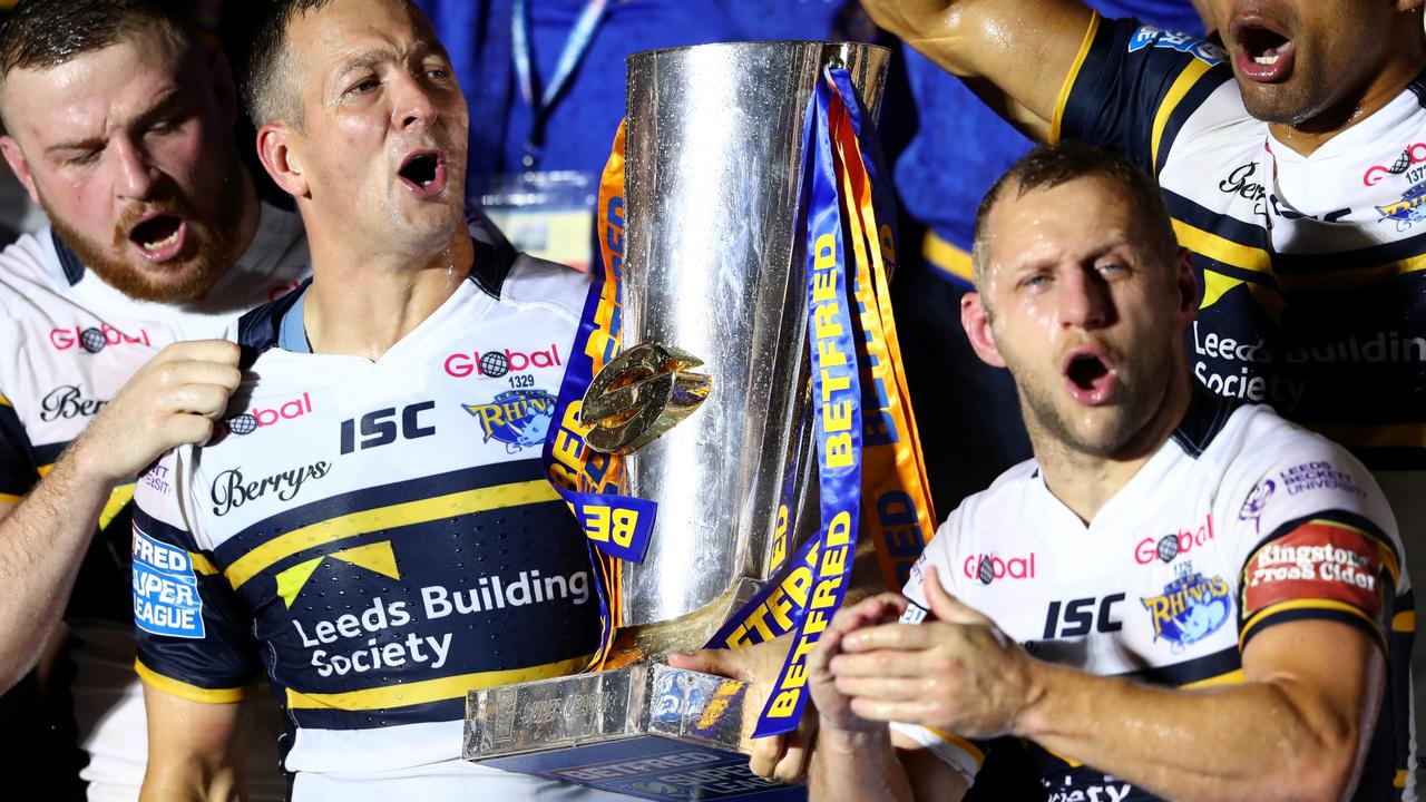 Danny McGuire and Rob Burrow of Leeds Rhinos celebrate a Super League Grand Final win. Photo by Michael Steele/Getty Images.