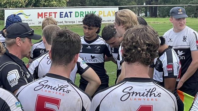 Souths listen to coach Cian O'Connor earlier in the season.