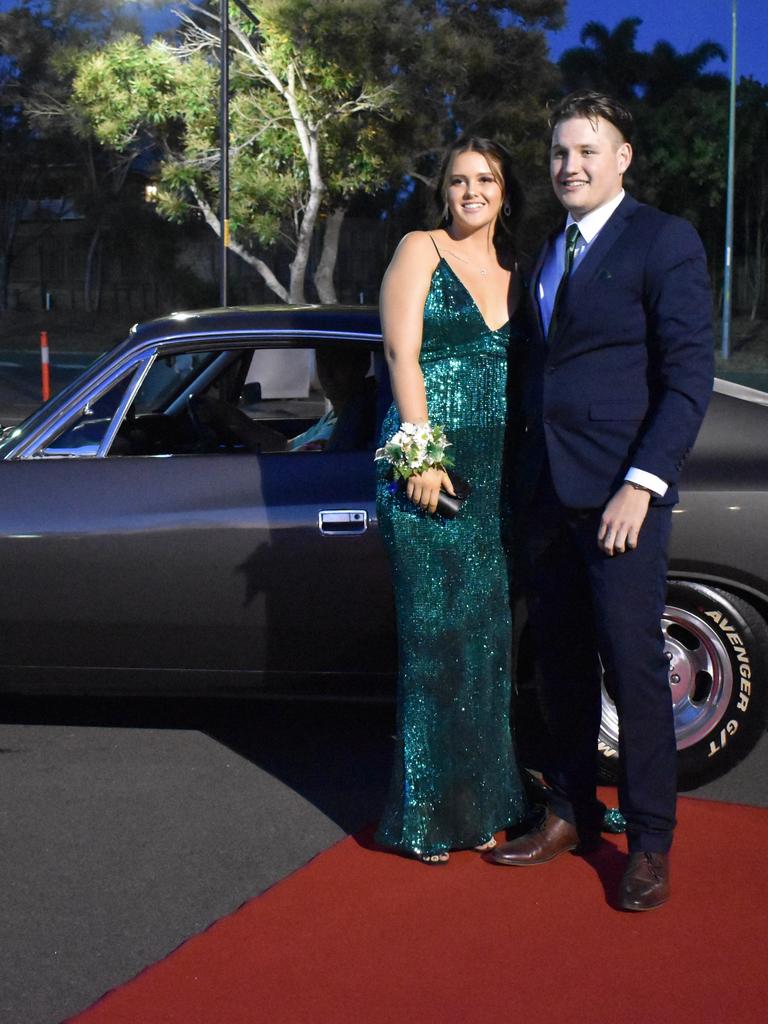 RIVERSIDE FORMAL: Connor Brown and Ella Hall stand proud on the red carpet at the Riverside Christian College Formal. Photo: Stuart Fast