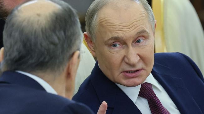Russian President Vladimir Putin attends a meeting with his Mongolian counterpart at the Kremlin in Moscow on May 7, 2025. (Photo by YURI KOCHETKOV / POOL / AFP)