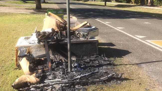 Delays in the annual kerbside clean up have led to rubbish piles like this one being set alight by vandals.