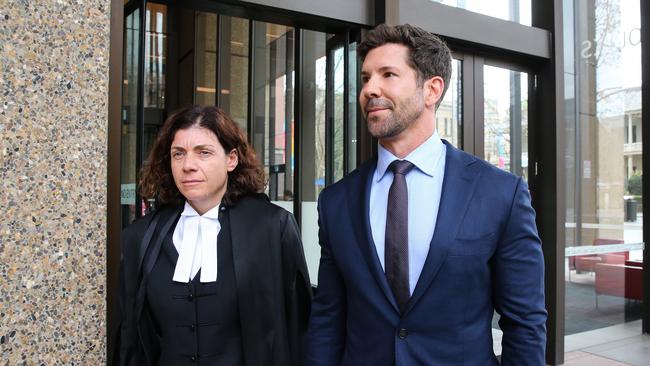 Former Commando Heston Russell is seen leaving the Federal Court in Sydney with defamation barrister Sue Chrysanthou. Picture: NCA Newswire /Gaye Gerard