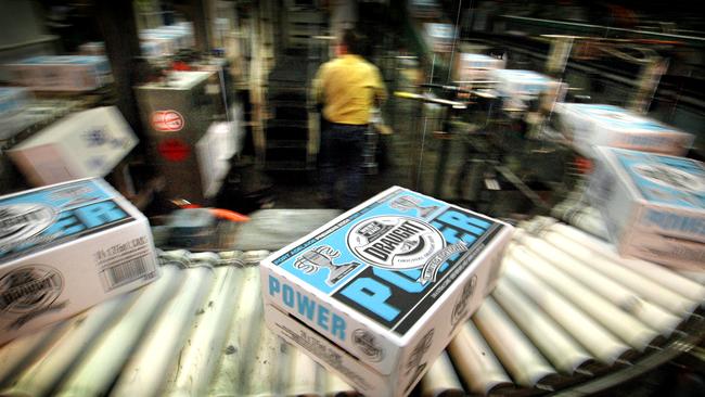 Slabs of West End's Power draught roll off the conveyor belt at the West End brewery in Adelaide.