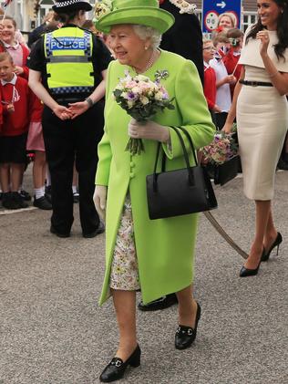 Queen Elizabeth sports quirky silver shoes at Order of the Garter ...