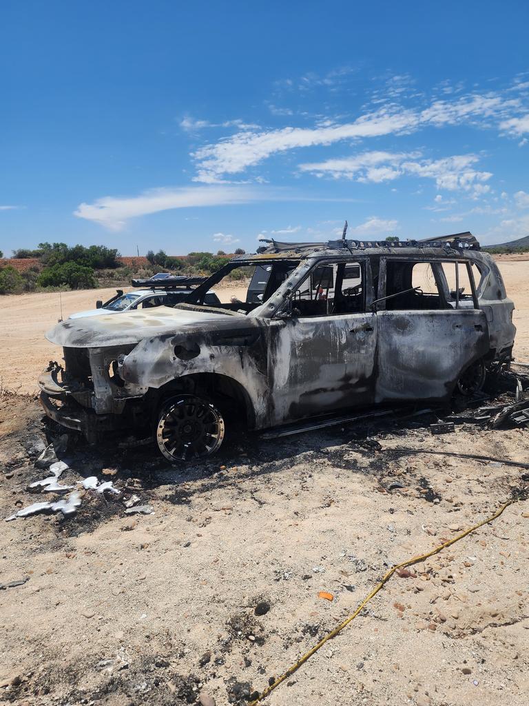 The caravan and car blew up in flames after an apparent electrical fire.