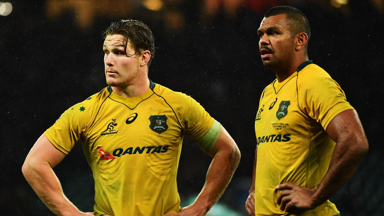 Michael Hooper and Kurtley Beale look on at Twickenham Stadium.