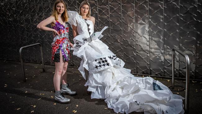 Moana from Finesse models wearing a wedding dress made from plastic bags created by fashion Tafe SA/Flinders graduate Ella Bowen (left). Picture: Tom Huntley