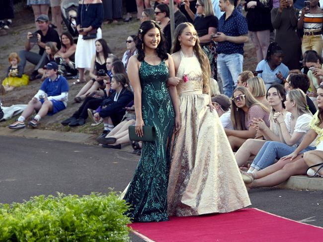 Harristown High School formal 2020 at Highfields Cultural Centre. From left; Milrus Caguimbal (left) and Emily Buckland.