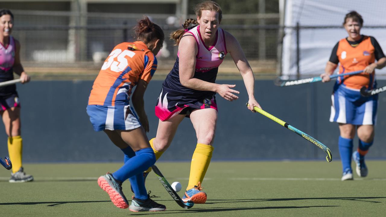 Alexandra Kennedy (right) of Toowoomba 2 against Maryborough 1.