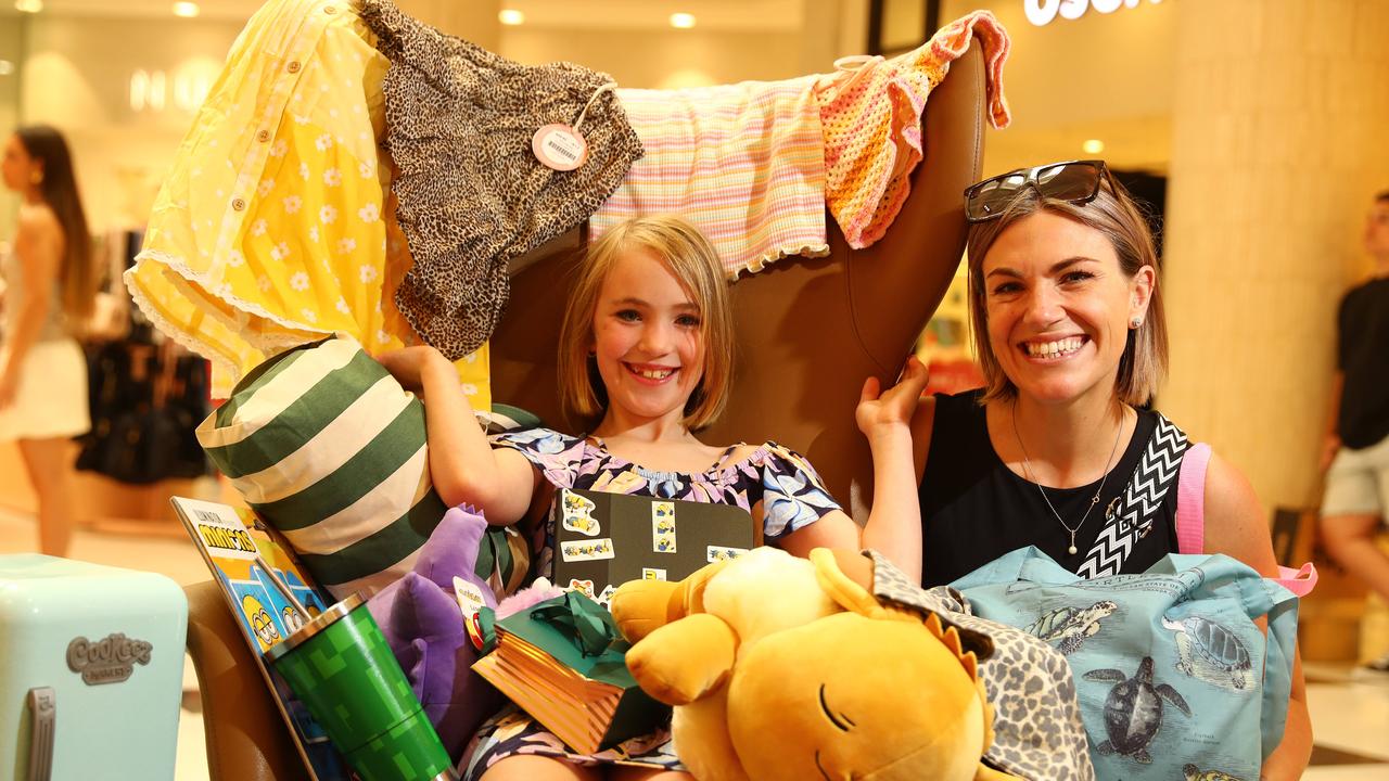 Eight year old Remy on a shopping spree at the Boxing Day sales in Westfield with her mum Tani Jacobi. Picture: Alison Wynd