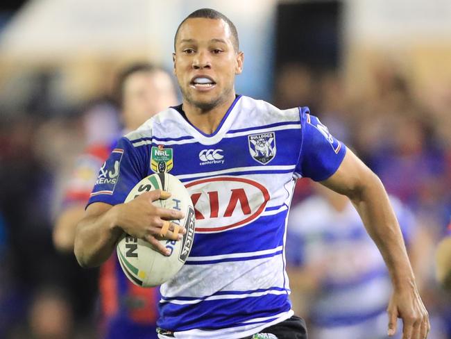 Moses Mbye races away to score during the Canterbury Bulldogs v Newcastle Knights NRL round 18 game at Belmore Sports Ground. Pic Mark Evans