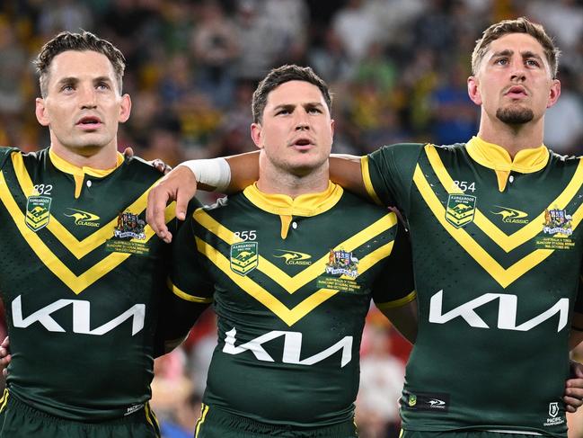 BRISBANE, AUSTRALIA - OCTOBER 18: The Australian players embrace during the men's 2024 Pacific Championships match between Australia Kangaroos and Tonga at Suncorp Stadium on October 18, 2024 in Brisbane, Australia. (Photo by Bradley Kanaris/Getty Images)