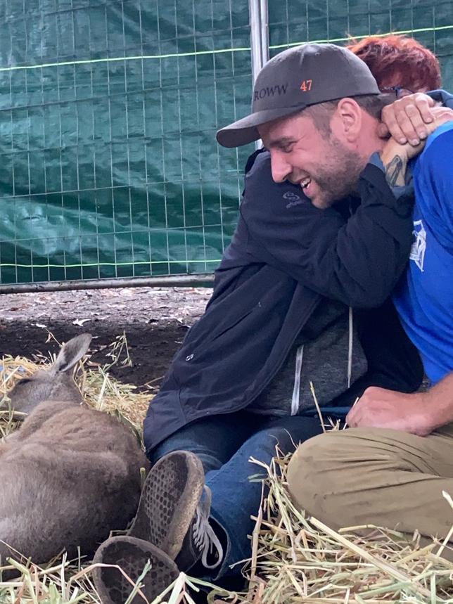 Rae Harvey thanks American Josh Stout from Reach Out World Wide who, along with five others, gave his time to build shelters from kangaroos at the Wild2Free sanctuary that was destroyed by bushfires.