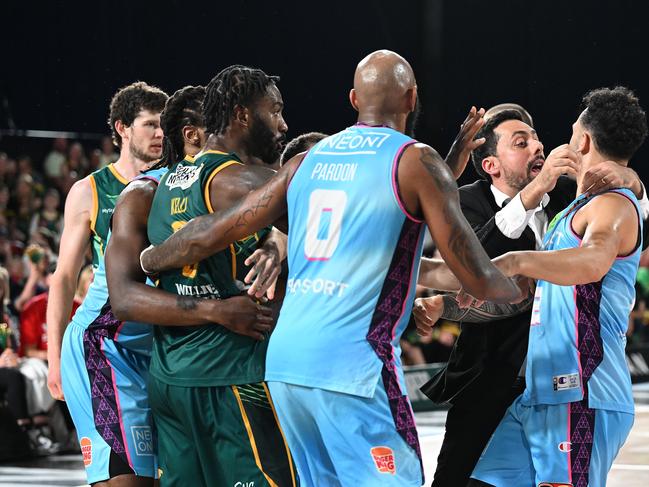 LAUNCESTON, AUSTRALIA - NOVEMBER 18: Mody Maor Head Coach of the Breakers pulls Izayah Le'Afa of the Breakers from a melee during the round 7 NBL match between Tasmania Jackjumpers and New Zealand Breakers at Silverdome, on November 18, 2022, in Launceston, Australia. (Photo by Steve Bell/Getty Images)