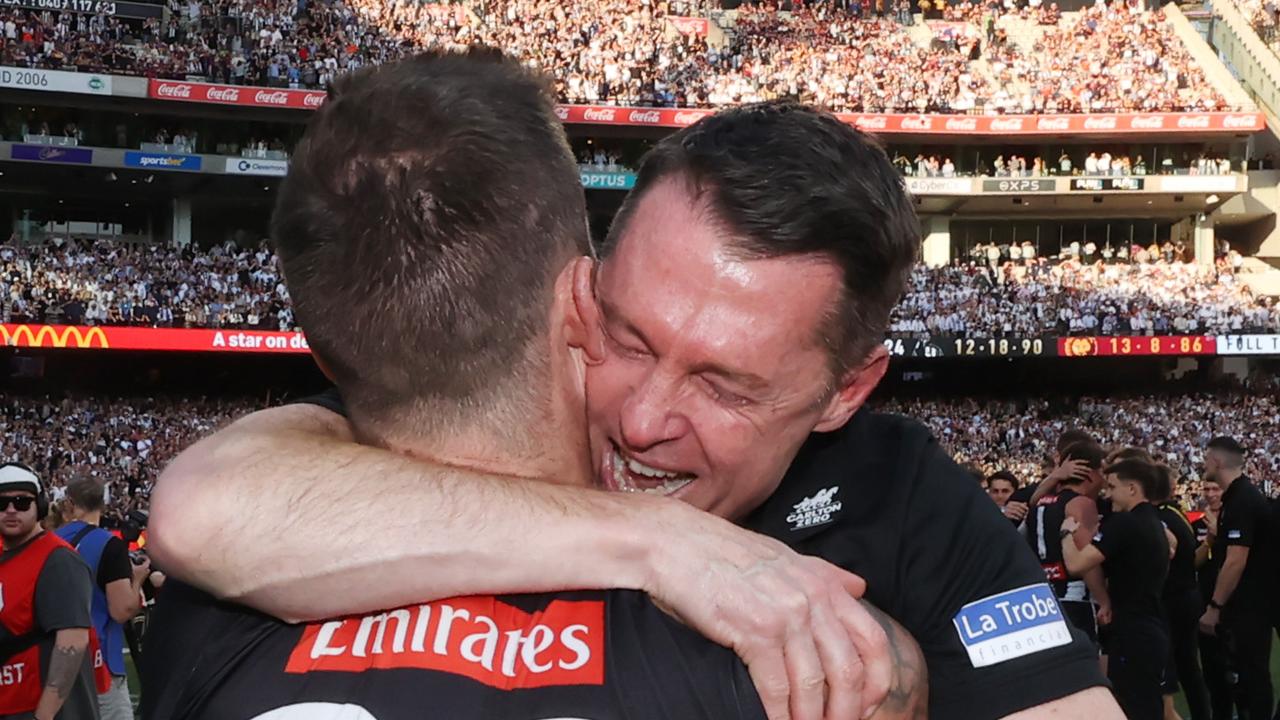 Jeremy Howe celebrates with coach Craig McRae. Picture: David Caird