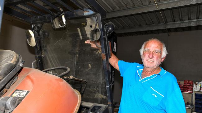 Service station owner Anthony Geard watched trucks being carried away by floodwaters. Picture: Cath Piltz