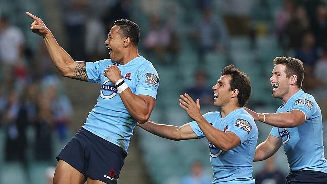 Israel Folau celebrates his try after just 30 seconds against the Bulls at Allianz Stadium.