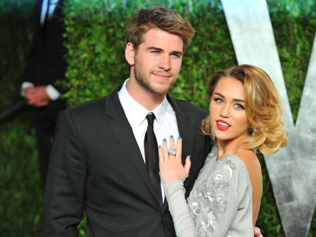 Happy days … Hemsworth with his estranged wife Miley Cyrus. Picture Alberto E. Rodriguez/Getty Images)